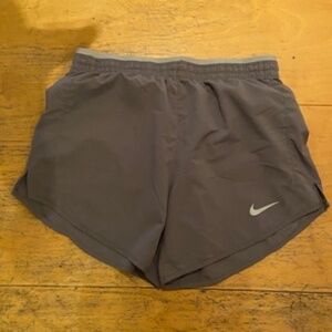 Grey women's Nike shorts Dri Fit fabric. Size Small S running shorts Like New